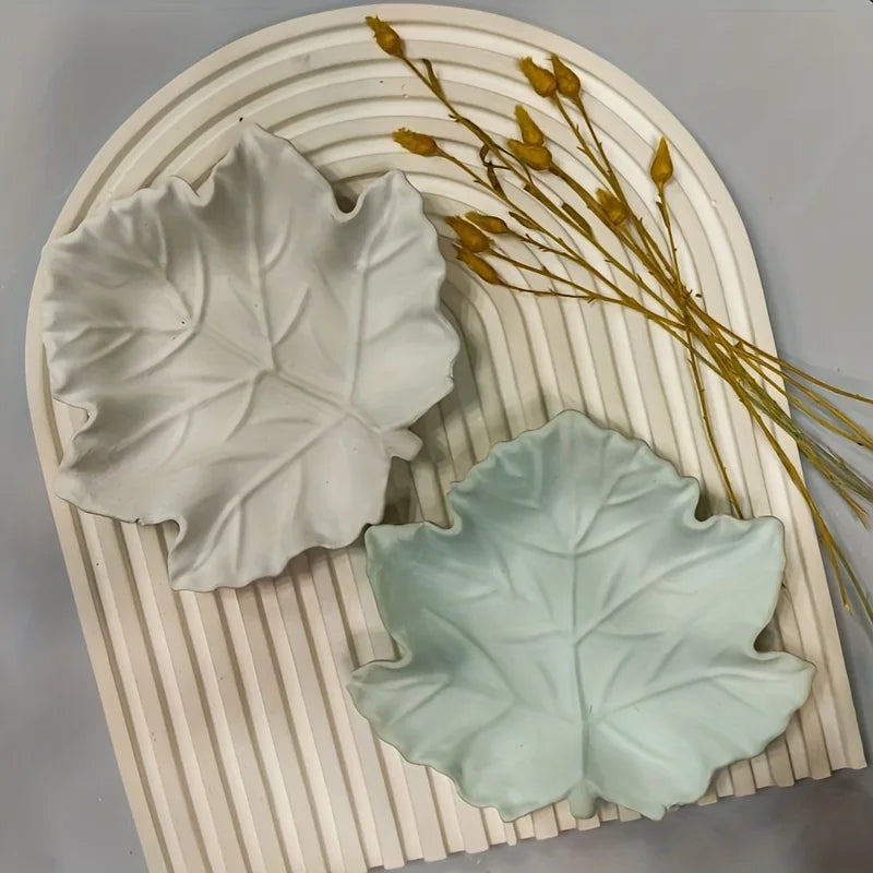 White and sage maple leaf casts on ribbed tray